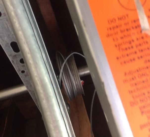 garage door roller cable track repair Lake Forest CA
